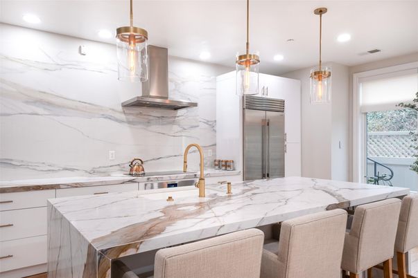 Interior, Kitchen, Marble Walls, Pendant Lights, Recessed Lighting, Stainless Steel Appliances