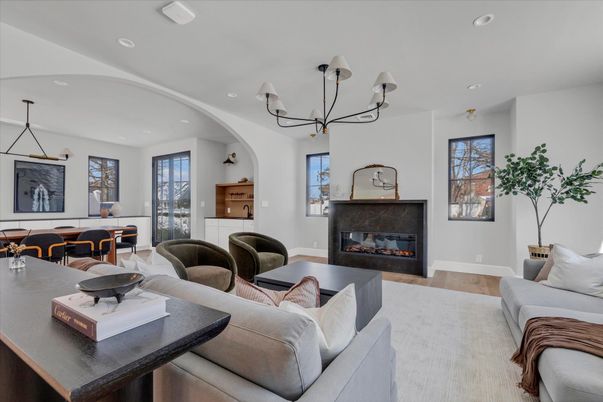 Chandelier, Dining room, Fireplace, Interior, Living room, Recessed Lighting, Wood Texture Flooring