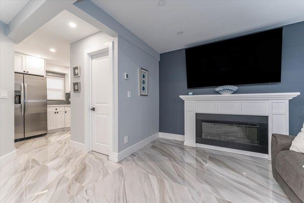 Fireplace, Interior, Kitchen, Marble, Recessed Lighting, Stainless Steel Appliances