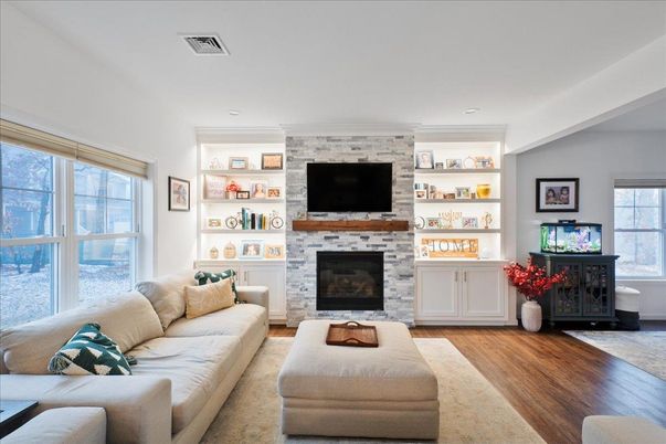 Fireplace, Interior, Living room, Recessed Lighting, Stone Walls, Wood Texture Flooring