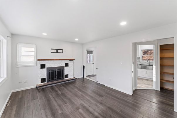 Empty room, Fireplace, Interior, Recessed Lighting, Wood Texture Flooring