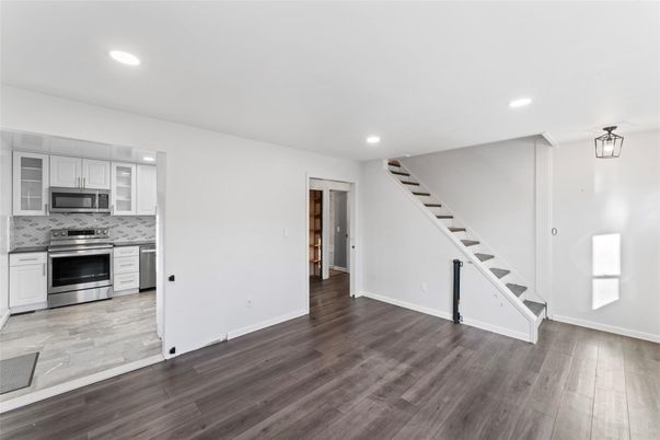 Interior, Kitchen, Recessed Lighting, Stainless Steel Appliances, Wood Texture Flooring