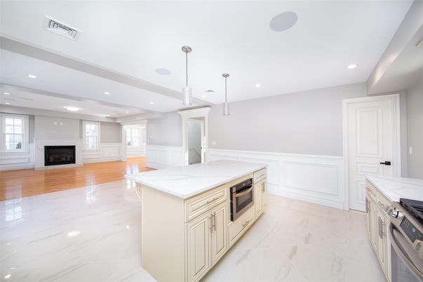 Fireplace, Interior, Kitchen, Marble, Pendant Lights, Recessed Lighting, Stainless Steel Appliances