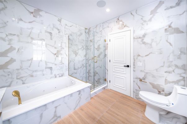 Bathroom, Glass Shower, Interior, Marble Walls, Recessed Lighting, Wood Texture Flooring