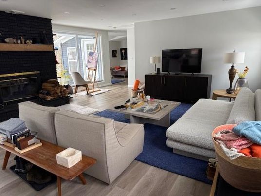 Fireplace, Interior, Living room, Recessed Lighting, Stone Walls, Wood Texture Flooring