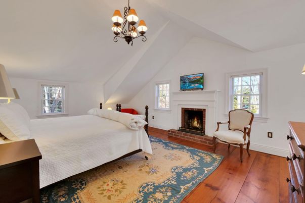 Bedroom, Chandelier, Fireplace, Interior, Wood Texture Flooring