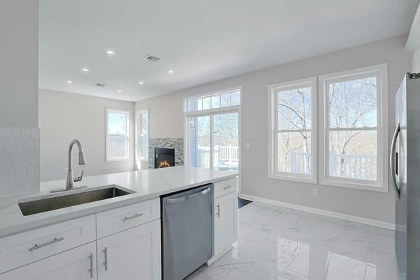 Fireplace, Interior, Kitchen, Marble, Recessed Lighting, Stainless Steel Appliances