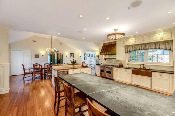 Chandelier, Dining room, Interior, Kitchen, Recessed Lighting, Stainless Steel Appliances, Wood Texture Flooring