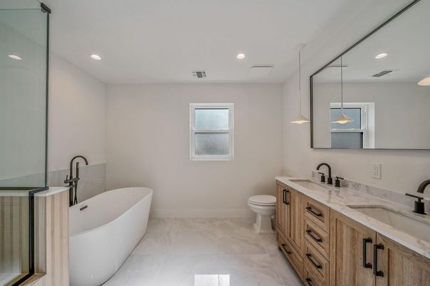Bathroom, Dual Sink Vanities, Free Standing Baths, Interior, Marble, Pendant Lights, Recessed Lighting