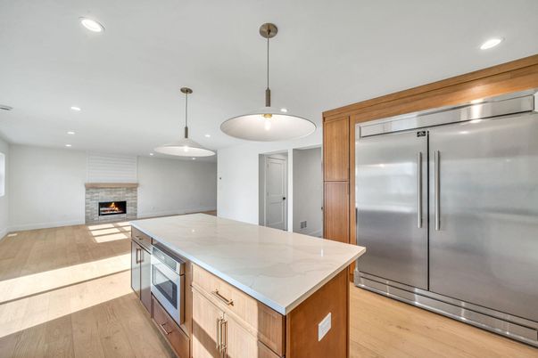 Fireplace, Interior, Kitchen, Pendant Lights, Recessed Lighting, Stainless Steel Appliances, Wood Texture Flooring