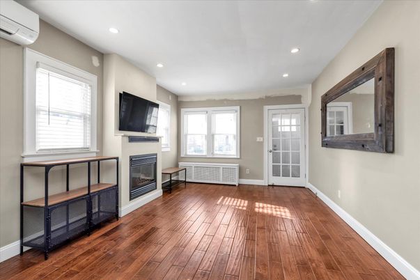Empty room, Fireplace, Interior, Recessed Lighting, Wood Texture Flooring