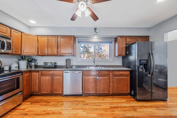 Interior, Kitchen, Recessed Lighting, Stainless Steel Appliances, Wood Texture Flooring