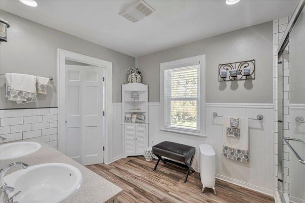 Bathroom, Dual Sink Vanities, Interior, Recessed Lighting, Wood Texture Flooring