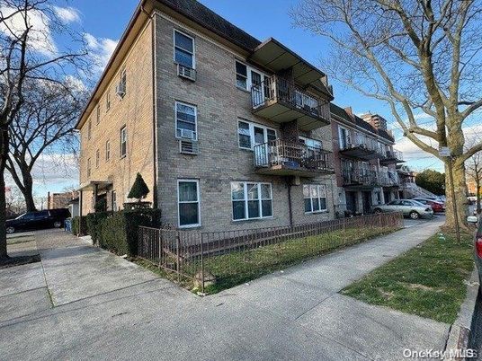 Exterior, Facade, Brick Facade, Condo Building