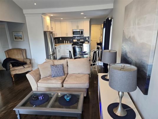 Dining room, Interior, Kitchen, Living room, Recessed Lighting, Stainless Steel Appliances, Wood Texture Flooring