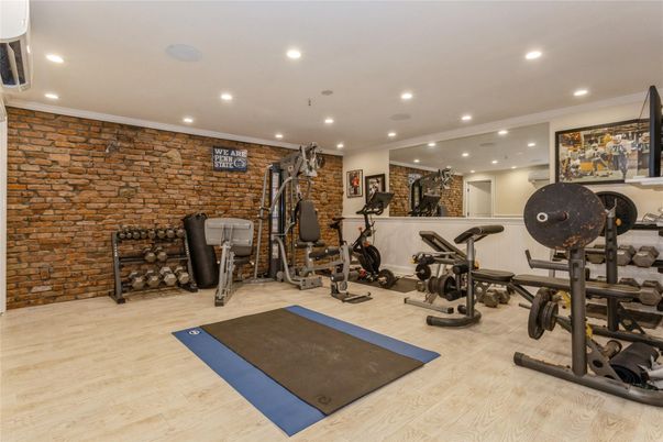 Fitness Equipment, Interior, Recessed Lighting, Stone Walls, Wood Texture Flooring