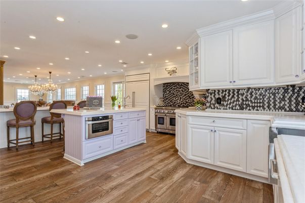 Chandelier, Dining room, Interior, Kitchen, Recessed Lighting, Stainless Steel Appliances, Wood Texture Flooring