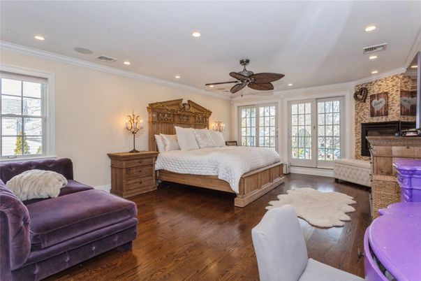 Bedroom, Fireplace, Interior, Recessed Lighting, Stone Walls, Wood Texture Flooring