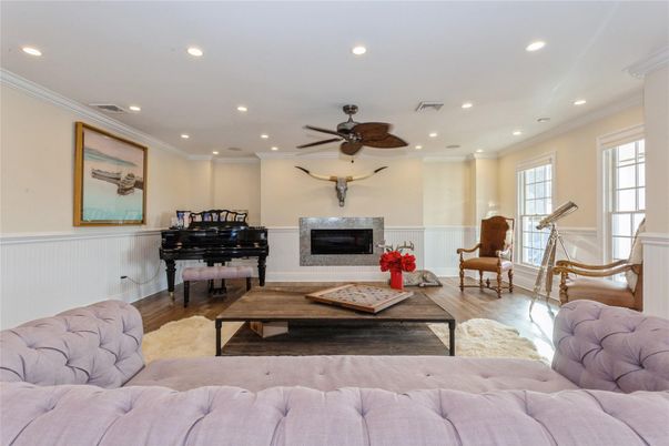 Fireplace, Interior, Living room, Piano, Recessed Lighting, Wood Texture Flooring