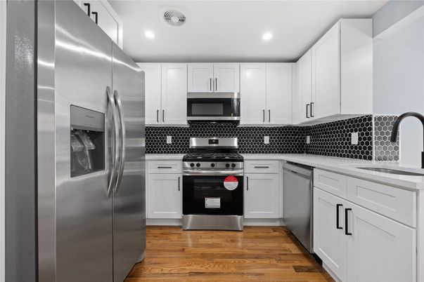 Interior, Kitchen, Recessed Lighting, Stainless Steel Appliances, Wood Texture Flooring