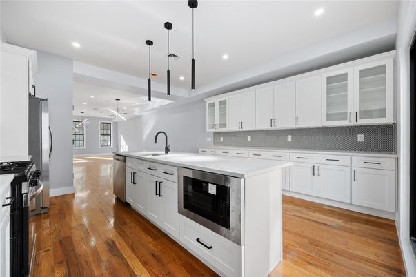 Interior, Kitchen, Pendant Lights, Recessed Lighting, Stainless Steel Appliances, Wood Texture Flooring