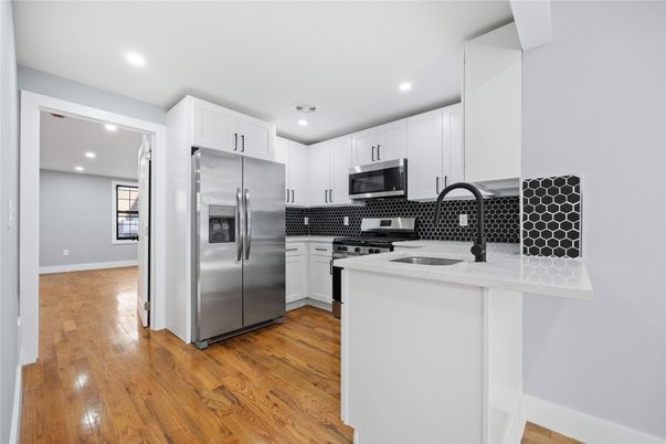 Interior, Kitchen, Recessed Lighting, Stainless Steel Appliances, Wood Texture Flooring