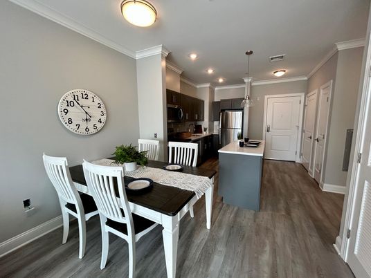 Dining room, Interior, Kitchen, Pendant Lights, Recessed Lighting, Stainless Steel Appliances, Wood Texture Flooring