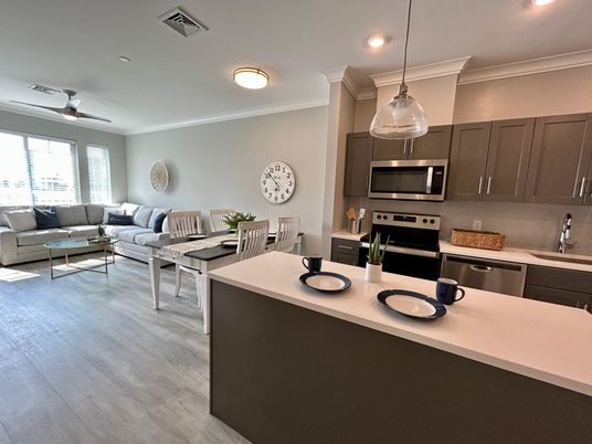Dining room, Interior, Kitchen, Living room, Pendant Lights, Recessed Lighting, Stainless Steel Appliances, Wood Texture Flooring