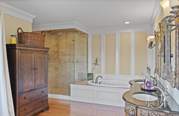 Bathroom, Dual Sink Vanities, Glass Shower, Interior, Recessed Lighting, Wood Texture Flooring