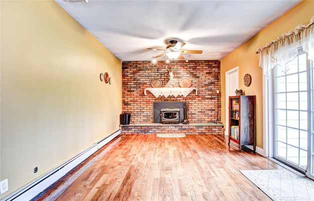 Empty room, Fireplace, Interior, Stone Walls, Wood Texture Flooring