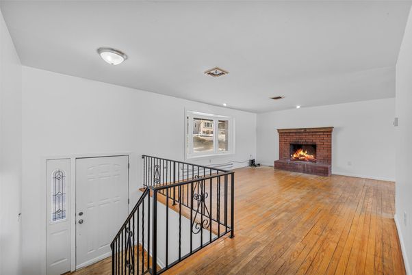 Fireplace, Interior, Recessed Lighting, Wood Texture Flooring