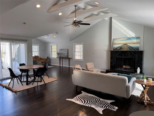 Dining room, Fireplace, Interior, Living room, Recessed Lighting, Wood Texture Flooring