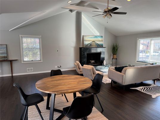 Dining room, Fireplace, Interior, Living room, Recessed Lighting, Wood Texture Flooring