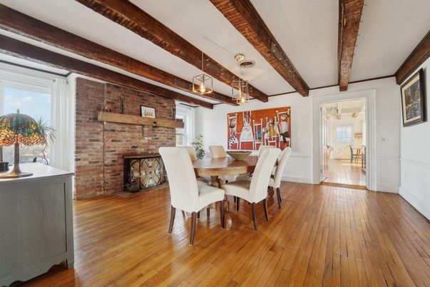 Dining room, Fireplace, Interior, Stone Walls, Wooden Beams, Wood Texture Flooring