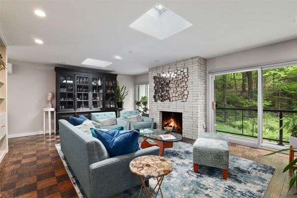Fireplace, Interior, Living room, Recessed Lighting, Stone Walls, Wood Texture Flooring