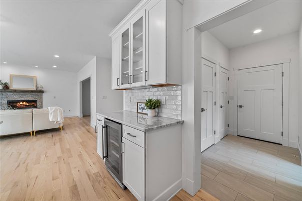 Fireplace, Interior, Kitchen, Recessed Lighting, Wood Texture Flooring