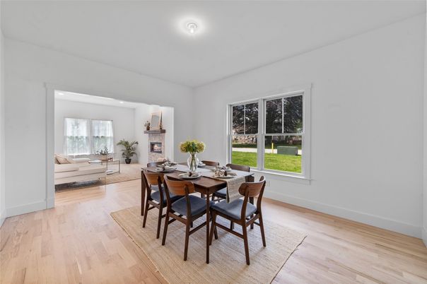 Dining room, Fireplace, Interior, Living room, Recessed Lighting, Wood Texture Flooring