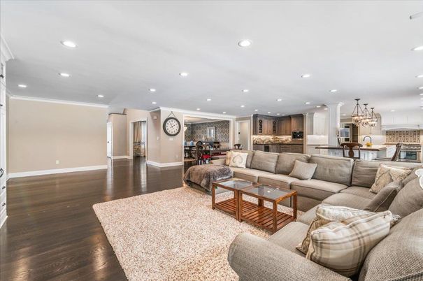 Chandelier, Interior, Kitchen, Living room, Pendant Lights, Recessed Lighting, Stainless Steel Appliances, Wood Texture Flooring