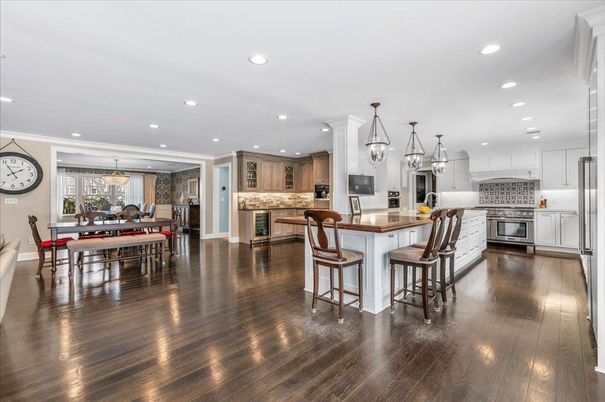 Dining room, Interior, Kitchen, Pendant Lights, Recessed Lighting, Stainless Steel Appliances, Wood Texture Flooring