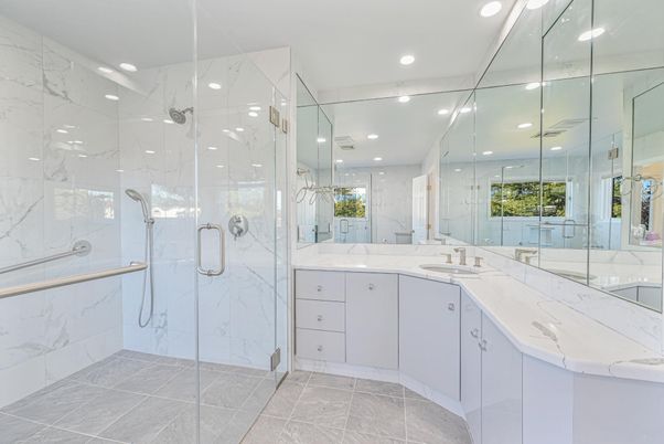 Bathroom, Dual Sink Vanities, Glass Shower, Interior, Marble, Marble Walls, Recessed Lighting