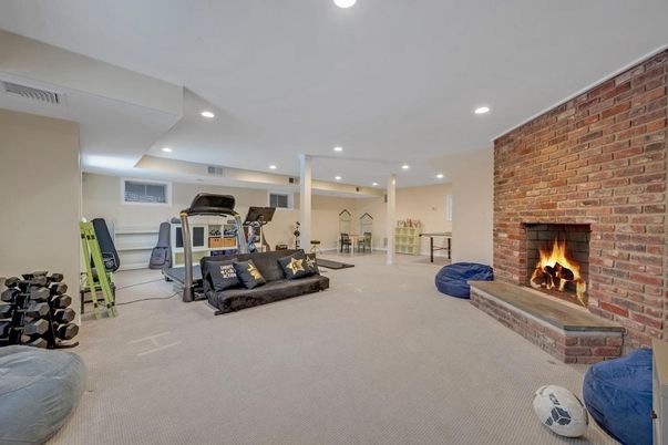 Fireplace, Fitness Equipment, Gym, Interior, Recessed Lighting, Stone Walls