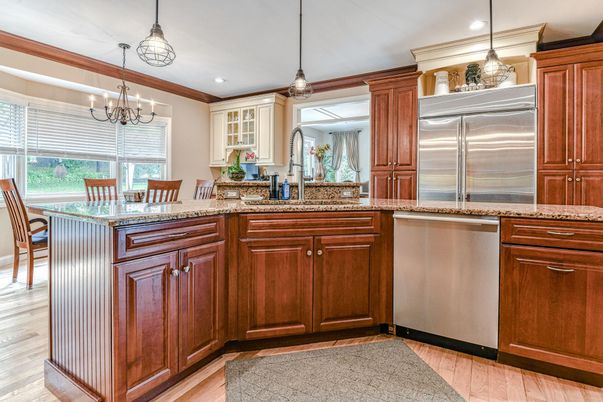 Chandelier, Dining room, Interior, Kitchen, Pendant Lights, Recessed Lighting, Stainless Steel Appliances, Wood Texture Flooring