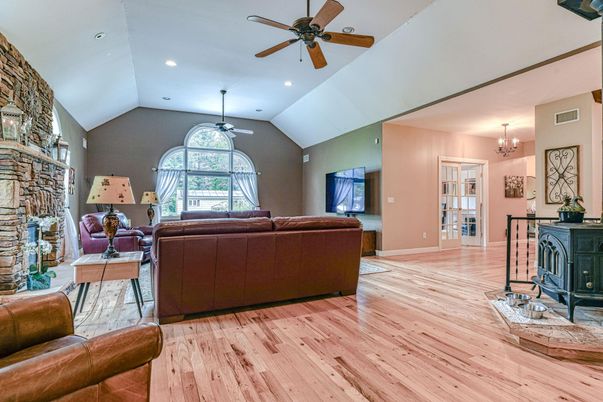 Chandelier, Fireplace, Interior, Living room, Recessed Lighting, Wood Texture Flooring