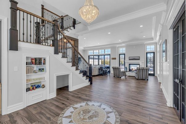 Chandelier, Fireplace, Interior, Living room, Recessed Lighting, Wood Texture Flooring