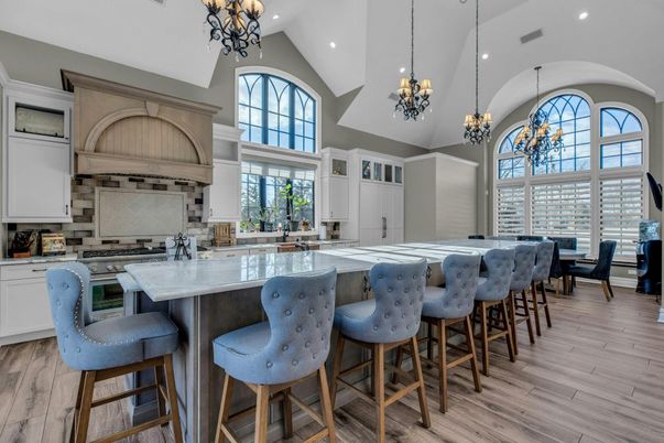 Chandelier, Dining room, Interior, Kitchen, Pendant Lights, Recessed Lighting, Stainless Steel Appliances, Wood Texture Flooring