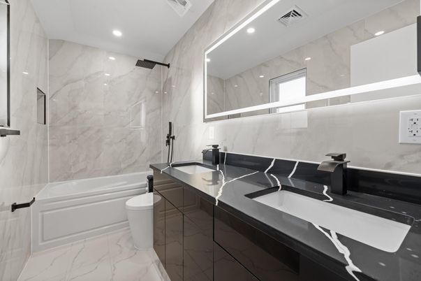 Bathroom, Dual Sink Vanities, Interior, Marble, Marble Walls, Recessed Lighting