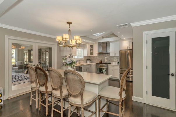 Chandelier, Dining room, Interior, Kitchen, Recessed Lighting, Stainless Steel Appliances, Wood Texture Flooring