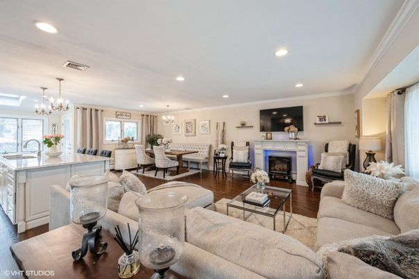 Chandelier, Dining room, Fireplace, Interior, Kitchen, Living room, Recessed Lighting, Wood Texture Flooring