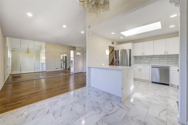 Interior, Kitchen, Marble, Recessed Lighting, Stainless Steel Appliances, Wood Texture Flooring