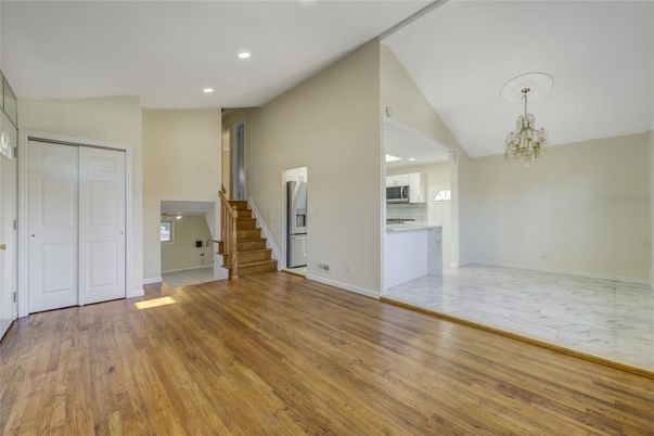 Chandelier, Empty room, Interior, Kitchen, Marble, Recessed Lighting, Wood Texture Flooring